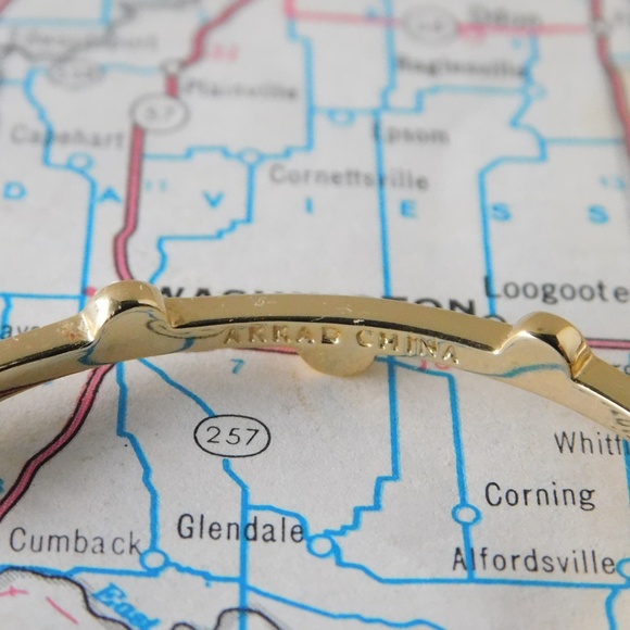 Two pairs of AKKAD gold toned hoop earrings - Picture 5 of 6